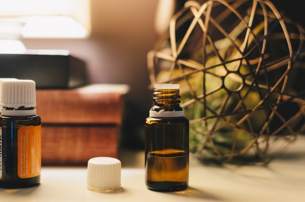 opened-amber-glass-vial-bottle-uao58q6ioxi Essential Oils at home